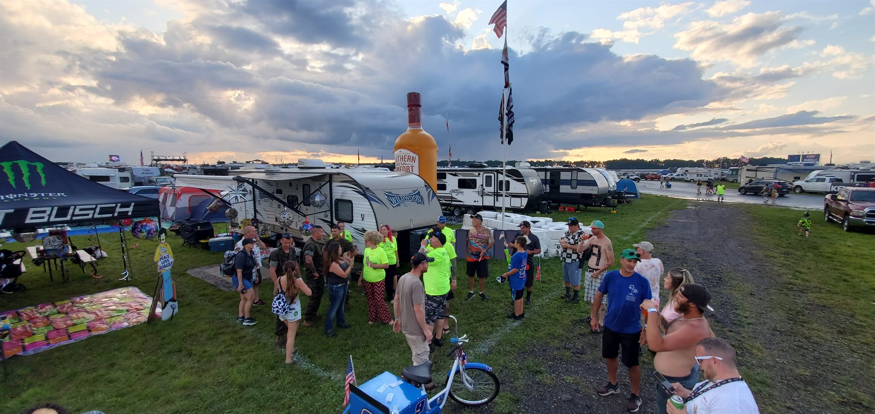 25ft flagpole camp party at dusk