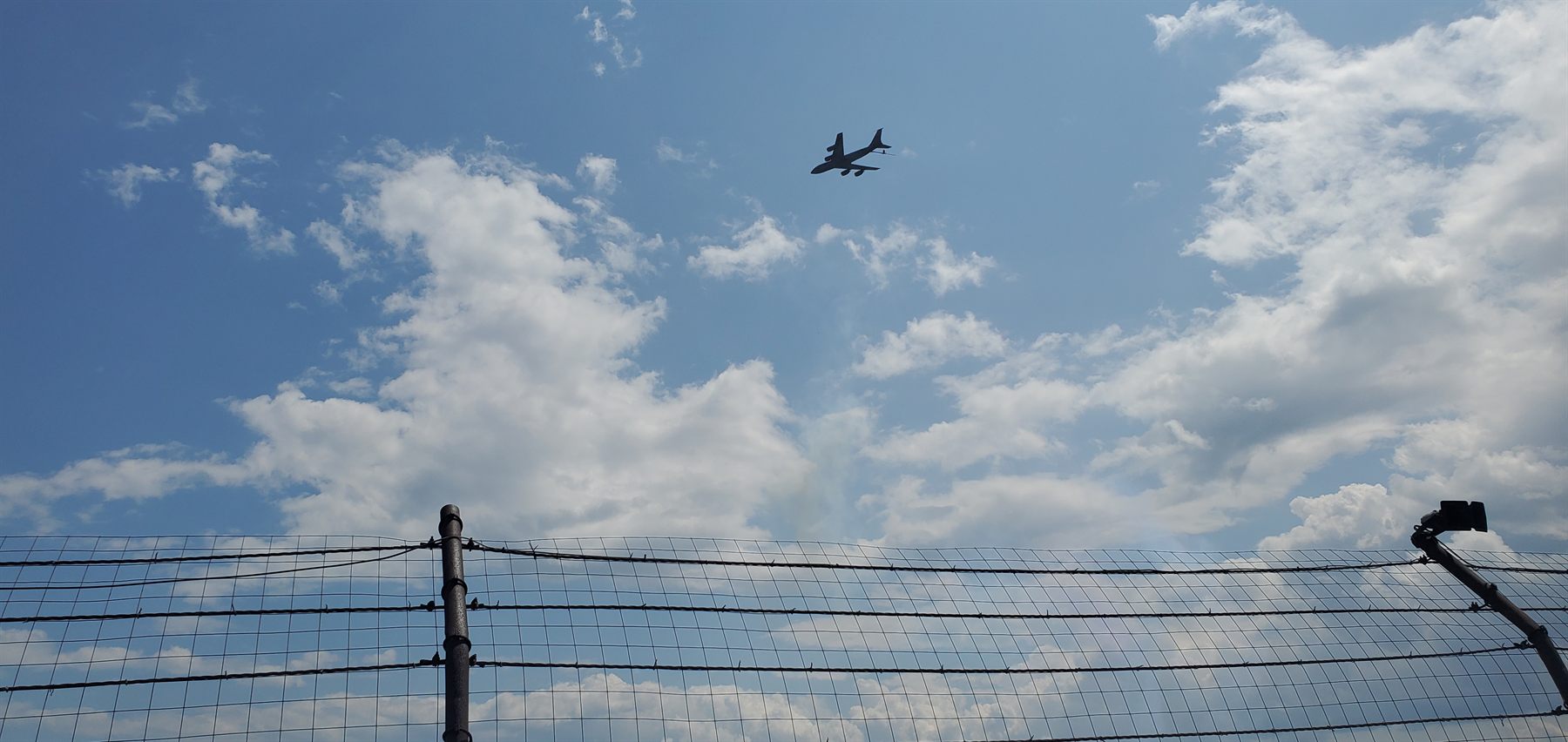 Pre-race military flyover over catch fence